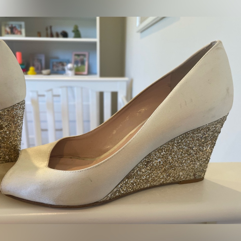 Kate Spade wedge heels, worn for wedding. Some smudges but can be cleaned